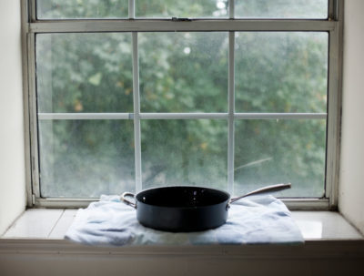 Skillet on towel on windowsill